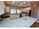 Modern kitchen with white cabinets, granite countertops, and stainless steel appliances at 2150 W Alameda Rd # 1109, Phoenix, AZ 85085