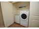Convenient laundry room equipped with a washer and dryer, providing practicality and functionality to the home at 2150 W Alameda Rd # 1109, Phoenix, AZ 85085