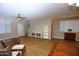 Bright living room with wood-look tile flooring, modern furnishings, and natural light at 2150 W Alameda Rd # 1109, Phoenix, AZ 85085
