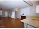 Bright, open-concept living room featuring hardwood floors and neutral paint scheme at 2150 W Alameda Rd # 1109, Phoenix, AZ 85085