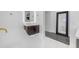 Modern bathroom showcases dual undermount sinks, chic cabinets, and a freestanding tub at 22317 N 39Th Run, Phoenix, AZ 85050
