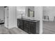 Hallway buffet is finished with gold hardware and a modern aesthetic at 22317 N 39Th Run, Phoenix, AZ 85050