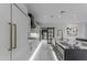 Open-concept kitchen with stylish island, white cabinetry, and stainless steel appliances at 22317 N 39Th Run, Phoenix, AZ 85050