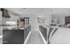 Gourmet kitchen with double islands, high-end appliances, custom hood, and an open layout for seamless entertaining at 22317 N 39Th Run, Phoenix, AZ 85050