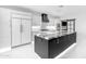 Chef's kitchen with a large island, premium appliances, and custom cabinetry, perfect for entertaining at 22317 N 39Th Run, Phoenix, AZ 85050