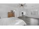 A view of the main bedroom's arched entryway and wood-look floors at 22317 N 39Th Run, Phoenix, AZ 85050