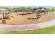 Playground featuring a variety of play structures and wood chip ground cover at 22317 N 39Th Run, Phoenix, AZ 85050