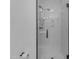 A modern walk-in shower featuring a sleek design with glass enclosure and minimalist hardware at 22317 N 39Th Run, Phoenix, AZ 85050