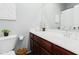 Stylish bathroom with a dark wood vanity, elegant mirror, and modern fixtures for a luxurious feel at 2402 E 5Th St # 1498, Tempe, AZ 85288