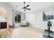 Inviting bedroom with large windows, a comfortable chair, and a sleek exercise bike for a balanced lifestyle at 2402 E 5Th St # 1498, Tempe, AZ 85288