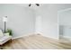 Spacious bedroom featuring light floors, neutral walls, and comfortable seating offers a relaxing retreat at 2402 E 5Th St # 1498, Tempe, AZ 85288