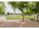 Well-maintained community park with lush green grass, mature trees, and pleasant walkways at 2402 E 5Th St # 1498, Tempe, AZ 85288