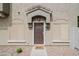 A welcoming front entry with a stylish door and manicured landscaping for a great first impression at 2402 E 5Th St # 1498, Tempe, AZ 85288