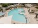A beautiful pool with lounge chairs and shaded seating areas for relaxing and enjoying the sun at 2402 E 5Th St # 1498, Tempe, AZ 85288