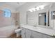 Bathroom features a tub and shower, sink, and toilet at 2434 S Colleen Sw --, Mesa, AZ 85210