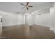 Expansive living area with tile floors, vaulted ceilings, and versatile space for customization and decor at 2434 S Colleen Sw --, Mesa, AZ 85210