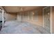 Covered patio with stone floor and view to the yard at 2434 S Colleen Sw --, Mesa, AZ 85210