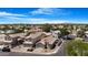 Picturesque aerial view of a residential neighborhood showcasing well-kept homes and tree-filled surroundings at 254 W Amoroso Dr, Gilbert, AZ 85233