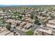 Overhead shot of a neighborhood in the desert with lakes and well maintained homes at 254 W Amoroso Dr, Gilbert, AZ 85233