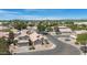 Scenic aerial shot of a suburban neighborhood highlighting tidy homes, established landscaping, and nearby amenities at 254 W Amoroso Dr, Gilbert, AZ 85233