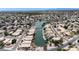Beautiful aerial view of lakeside homes with community water access and well-maintained streets and desert landscaping at 254 W Amoroso Dr, Gilbert, AZ 85233