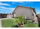 Serene backyard featuring lush artificial grass, a charming gazebo with outdoor seating, and low-maintenance landscaping at 254 W Amoroso Dr, Gilbert, AZ 85233
