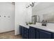 Bathroom featuring double sinks, quartz countertops and tiled flooring at 254 W Amoroso Dr, Gilbert, AZ 85233