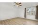 Bedroom features a large window providing plenty of natural light and neutral colored walls at 254 W Amoroso Dr, Gilbert, AZ 85233