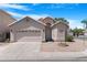 Charming single-Gathering home with a two-car garage, desert landscaping, and a welcoming front entrance at 254 W Amoroso Dr, Gilbert, AZ 85233