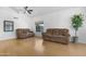 Spacious living room with wood floors and lots of natural light at 254 W Amoroso Dr, Gilbert, AZ 85233