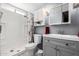 Bathroom featuring a shower, toilet, vanity with cabinet, and mirrored medicine cabinet at 2650 W Union Hills Dr # 164, Phoenix, AZ 85027