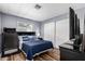Relaxing bedroom with natural light, a comfortable bed, and ample closet space at 2650 W Union Hills Dr # 164, Phoenix, AZ 85027