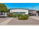 Charming single-story home with tidy landscaping, covered parking, and cheerful curb appeal at 2650 W Union Hills Dr # 164, Phoenix, AZ 85027
