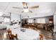 Open floor plan offers living and dining area with wood-look floors and light grey walls at 2650 W Union Hills Dr # 164, Phoenix, AZ 85027