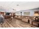 Living room with laminate wood flooring and comfortable seating arrangement at 2650 W Union Hills Dr # 164, Phoenix, AZ 85027