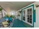 Covered outdoor porch with seating and plants, creating a relaxing outdoor space at 2650 W Union Hills Dr # 164, Phoenix, AZ 85027