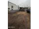 A compact home includes gravel yard and privacy fence for added comfort at 2721 E Beverly Ln, Phoenix, AZ 85032