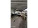 Large covered parking area with ample space for vehicles and storage at 2721 E Beverly Ln, Phoenix, AZ 85032