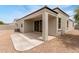 Covered patio and gravel backyard at 30390 W Mitchell Ave, Buckeye, AZ 85396