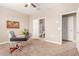 Bedroom featuring a workspace and access to the bathroom at 30390 W Mitchell Ave, Buckeye, AZ 85396