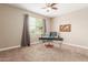 Bedroom featuring natural light and a workspace at 30390 W Mitchell Ave, Buckeye, AZ 85396