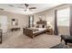 Spacious main bedroom with carpet flooring, ceiling fan, and plenty of natural light at 30390 W Mitchell Ave, Buckeye, AZ 85396