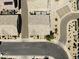 Aerial view showcasing the neighborhood's layout, landscaping, and street pattern at 324 N 56Th Pl, Mesa, AZ 85205