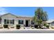 Inviting single-story home with well-maintained desert landscaping in the front yard at 324 N 56Th Pl, Mesa, AZ 85205