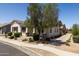 Single Gathering home with desert landscaping and welcoming entrance at 324 N 56Th Pl, Mesa, AZ 85205
