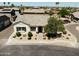 Charming single-Gathering home with desert landscaping and a well-manicured yard at 324 N 56Th Pl, Mesa, AZ 85205
