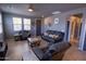 Inviting living room featuring a neutral palette, tile floors, and cozy seating at 324 N 56Th Pl, Mesa, AZ 85205