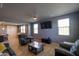 Spacious living room with tile floors, neutral paint, and comfortable seating, perfect for relaxing at 324 N 56Th Pl, Mesa, AZ 85205