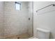 Contemporary tiled shower with glass door and chrome fixtures at 3332 S Quinn Ave, Gilbert, AZ 85297