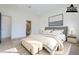 Virtually staged bedroom with ensuite bathroom at 3332 S Quinn Ave, Gilbert, AZ 85297